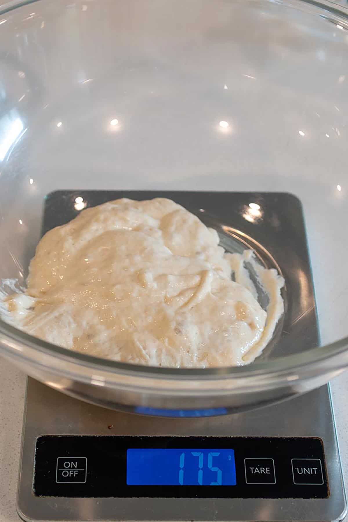 Sourdough Starter in a glass bowl on a digital scale.