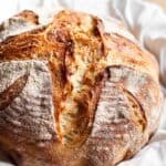 A loaf of homemade sourdough bread.