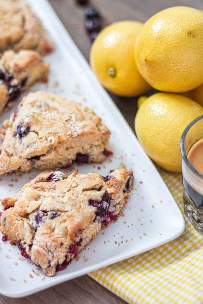 Fresh Homemade Blueberry scones with lemons blueberry and a shot of espresso.