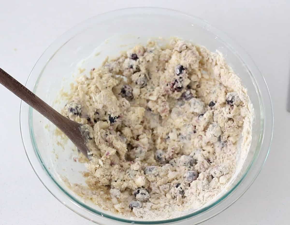 Blueberry lemon scone dough in mixing bowl