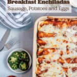 A baking pan with homemade breakfast enchiladas topped with cheese and prep bowls with fresh toppings.