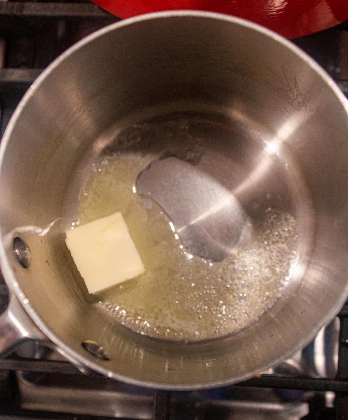 Butter melting in a small saucepan to start a roux. 