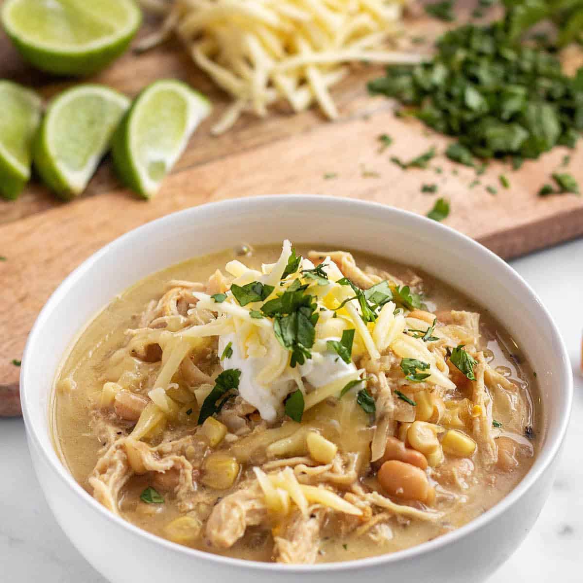 Creamy White Chicken Chili in a Crock Pot - Dirt and Dough