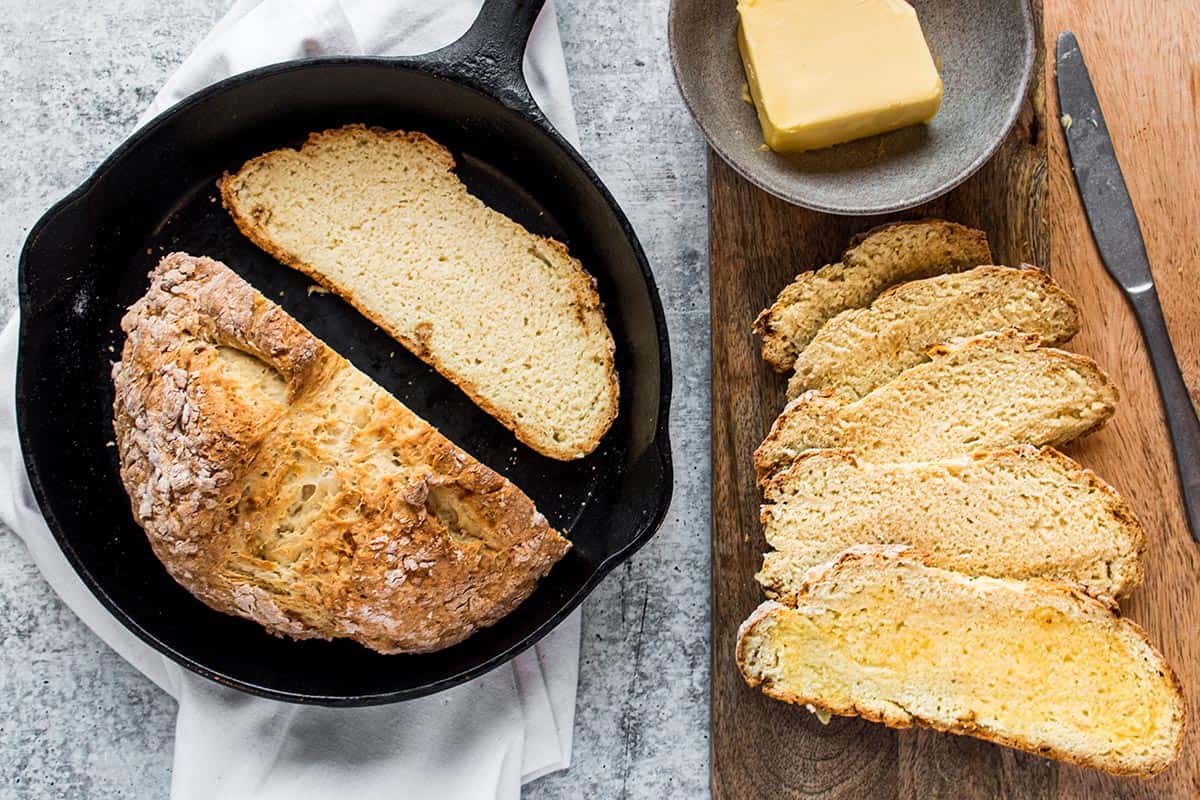 Cast iron pan with a loaf of Irish Soda Bread. 