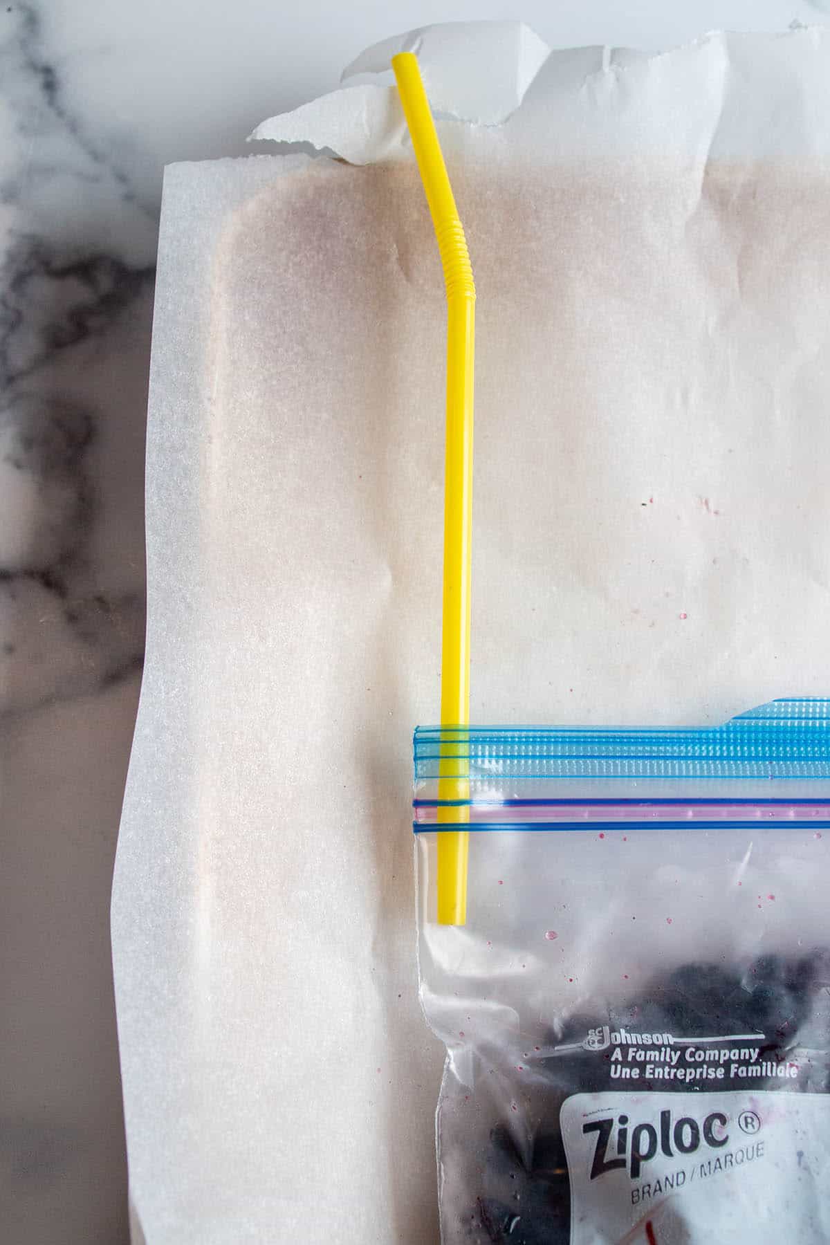 Ziplock bag with a straw in the corner to help remove all the air.
