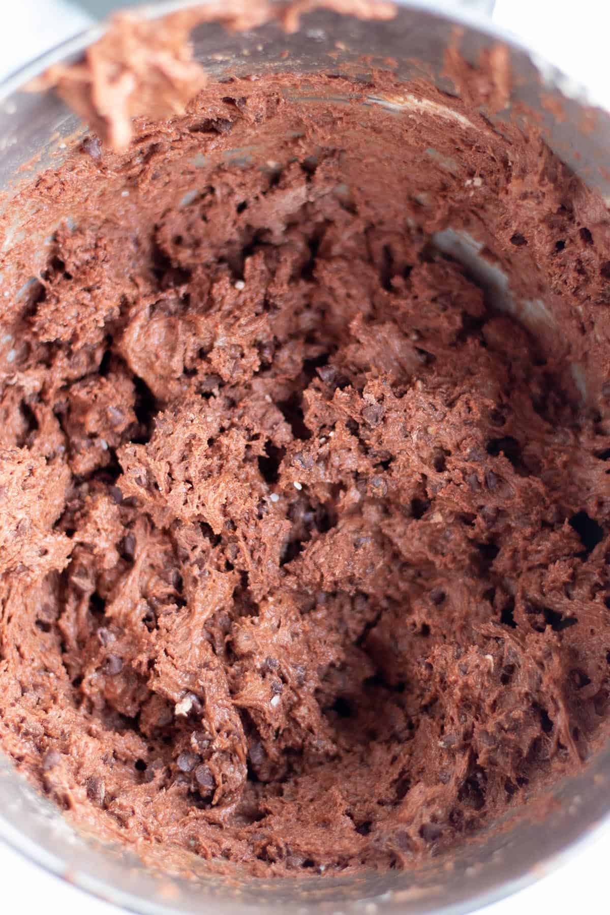 A stand mixer with sourdough discard chocolate cookie dough.