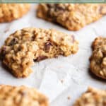 Baking sheet with cookies with text that says sourdough oatmeal cookies.