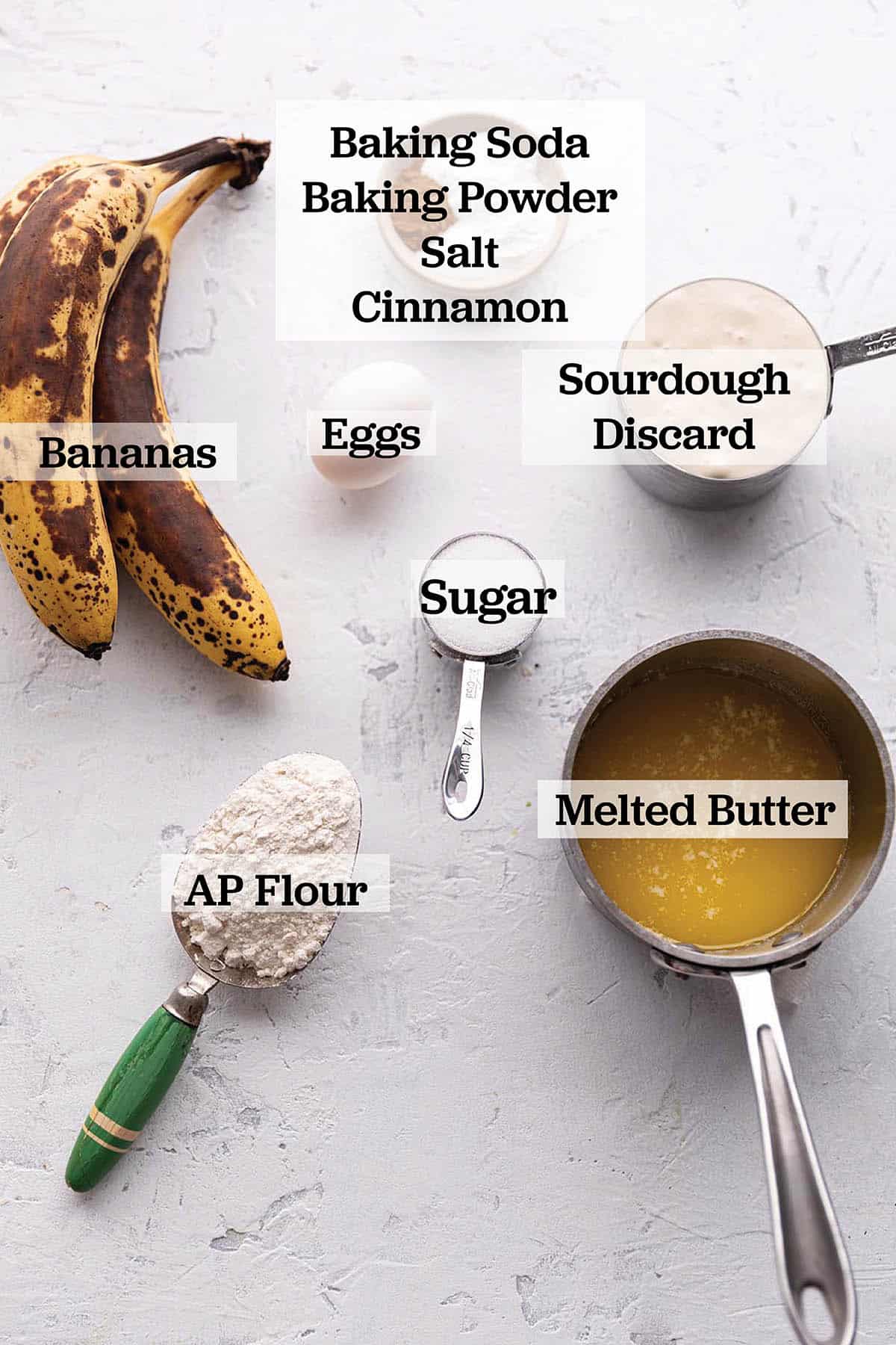 Bananas, flour, melted butter, sourdough discard, baking powder, baking soda salt and an egg.